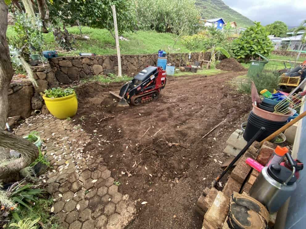 Backyard slope before retaining wall construction