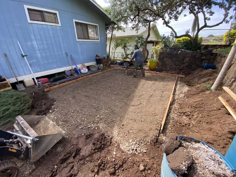 Compacted gravel base layer prepared for the gazebo’s concrete slab foundation.